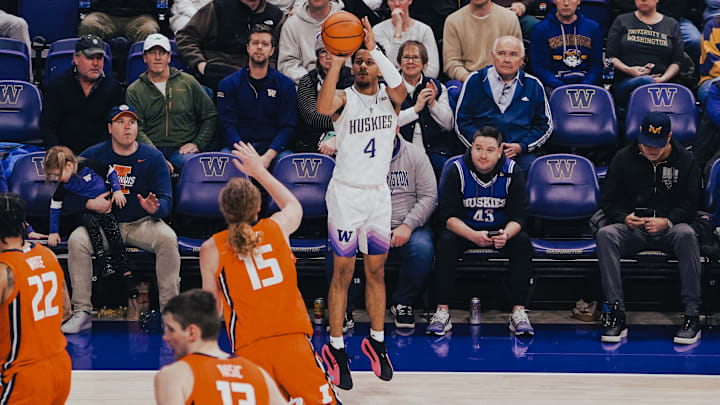 DJ Davis takes aim with a 3-pointer against Illinois.