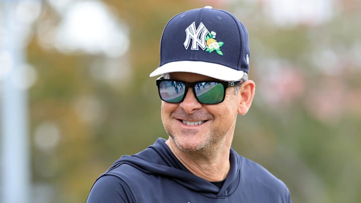 Feb 12, 2026; Tampa, FL, USA;  New York Yankees manager Aaron Boone (17) works out during spring training workouts at George M. Steinbrenner Field. Mandatory Credit: Kim Klement Neitzel-Imagn Images