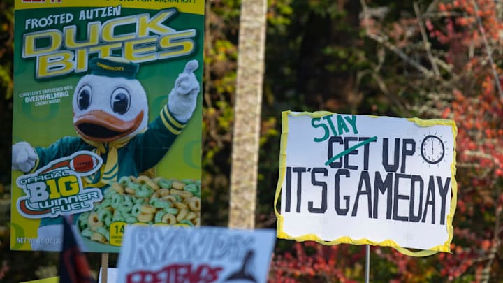 Signs during ESPN’s “College GameDay” Saturday, Oct. 12, 2024 on the campus of the University of Oregon in Eugene, Ore.