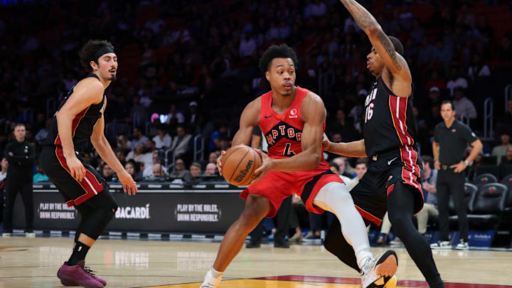 Dec 15, 2025; Miami, Florida, USA; Toronto Raptors forward Scottie Barnes (4) drives to the basket against Miami Heat forward Keshad Johnson (16) during the second quarter at Kaseya Center. Mandatory Credit: Sam Navarro-Imagn Images Dec 15, 2025; Miami, Florida, USA; Toronto Raptors forward Scottie Barnes (4) drives to the basket against Miami Heat forward Keshad Johnson (16) during the second quarter at Kaseya Center. Mandatory Credit: Sam Navarro-Imagn Images