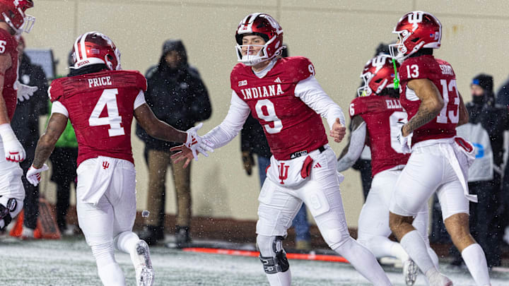 Indiana quarterback Kurtis Rourke (9) celebrates a touchdown in the first quarter against Purdue on Saturday. Indiana quarterback Kurtis Rourke (9) celebrates a touchdown in the first quarter against Purdue on Saturday.