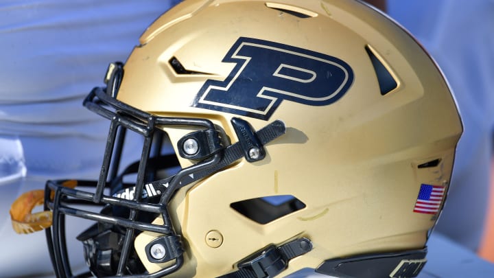 Purdue Boilermakers helmet sits ready on the bench. Purdue Boilermakers helmet sits ready on the bench.