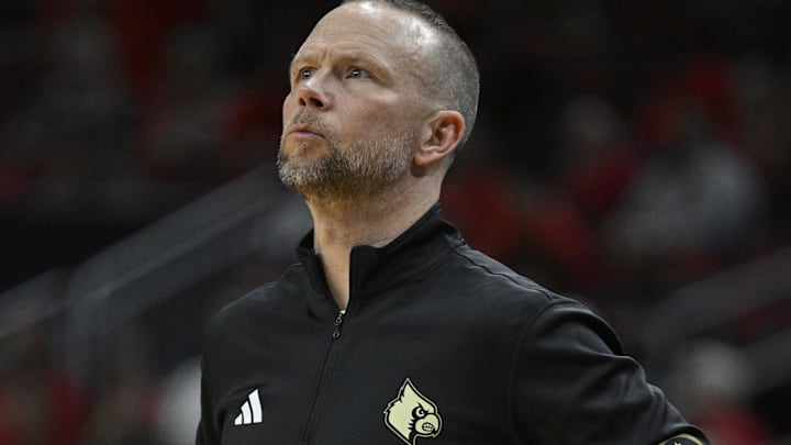 Nov 15, 2025; Louisville, Kentucky, USA;  Louisville Cardinals head coach Pat Kelsey watches from the sideline during the second half against the Ohio Bobcats at KFC Yum! Center. Louisville defeated Ohio 106-81. Mandatory Credit: Jamie Rhodes-Imagn Images