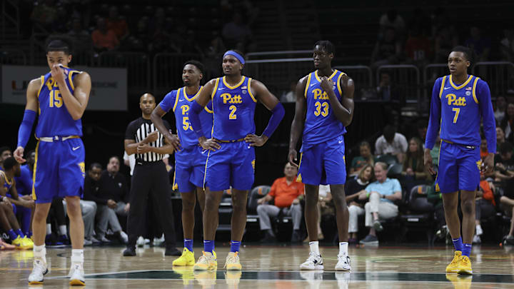 Jan 27, 2024; Coral Gables, Florida, USA; Pittsburgh Panthers guard Jaland Lowe (15), forward Zack Austin (55), forward Blake Hinson (2), center Federiko Federiko (33), and guard Carlton Carrington (7) look on from the court against the Miami Hurricanes during the first half at Watsco Center. Mandatory Credit: Sam Navarro-Imagn Images