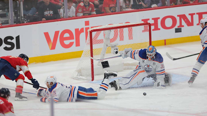 Jun 12, 2025; Sunrise, Florida, USA; Edmonton Oilers defenseman Darnell Nurse (25) and goaltender Calvin Pickard (30) defend against Florida Panthers forward Evan Rodrigues (17) during the third period in game four of the 2025 Stanley Cup Final at Amerant Bank Arena.