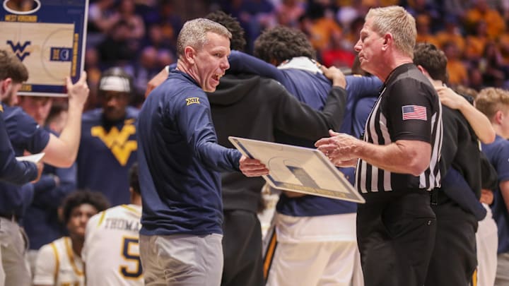 Feb 28, 2026; Morgantown, West Virginia, USA; West Virginia Mountaineers head coach Ross Hodge argues a call during the first half against the BYU Cougars at Hope Coliseum. Mandatory Credit: Ben Queen-Imagn Images