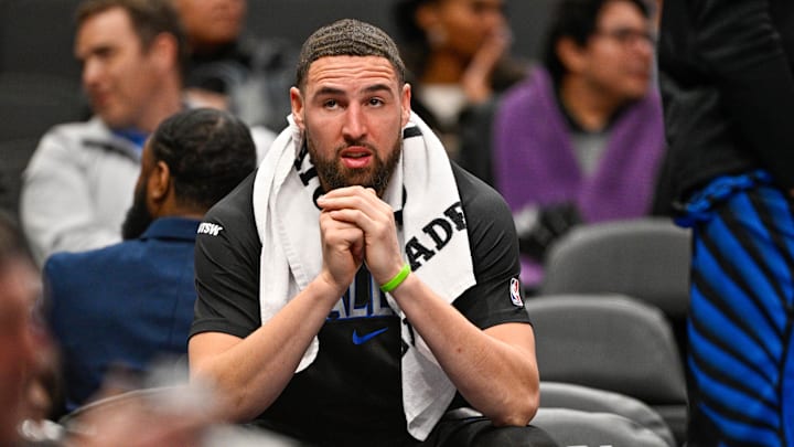 Jan 14, 2026; Dallas, Texas, USA; Dallas Mavericks guard Klay Thompson (31) looks down on the team bench during the second half against the Denver Nuggets at the American Airlines Center. Mandatory Credit: Jerome Miron-Imagn Images