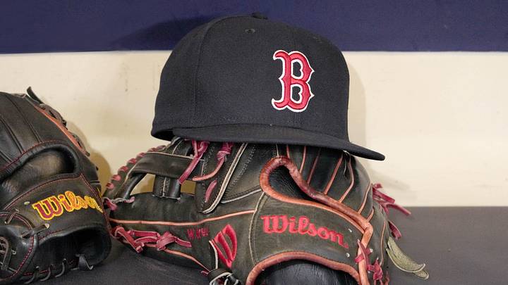 May 27, 2025; Milwaukee, Wisconsin, USA; A Boston Red Sox hat and glove sit in the dug out before a game against the Milwaukee Brewers at American Family Field. Mandatory Credit: Michael McLoone-Imagn Images May 27, 2025; Milwaukee, Wisconsin, USA; A Boston Red Sox hat and glove sit in the dug out before a game against the Milwaukee Brewers at American Family Field. Mandatory Credit: Michael McLoone-Imagn Images