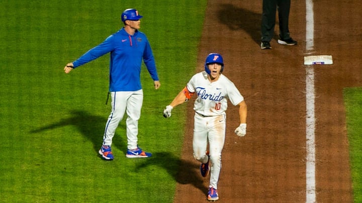 Gators infielder Colby Shelton (10) knocks one out of the ballpark in the bottom of the fifth inning