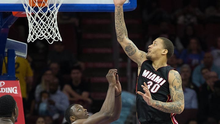 Apr 15, 2015; Philadelphia, PA, USA; Miami Heat forward Michael Beasley (30) shoots past Philadelphia 76ers forward Jerami Grant (39) during the first quarter at Wells Fargo Center. Mandatory Credit: Bill Streicher-Imagn Images Apr 15, 2015; Philadelphia, PA, USA; Miami Heat forward Michael Beasley (30) shoots past Philadelphia 76ers forward Jerami Grant (39) during the first quarter at Wells Fargo Center. Mandatory Credit: Bill Streicher-Imagn Images