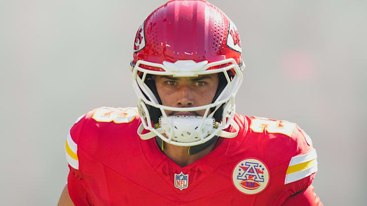 Sep 28, 2025; Kansas City, Missouri, USA; Kansas City Chiefs linebacker Drue Tranquill (23) takes the field prior to a game against the Baltimore Ravens at GEHA Field at Arrowhead Stadium. Mandatory Credit: Jay Biggerstaff-Imagn Images