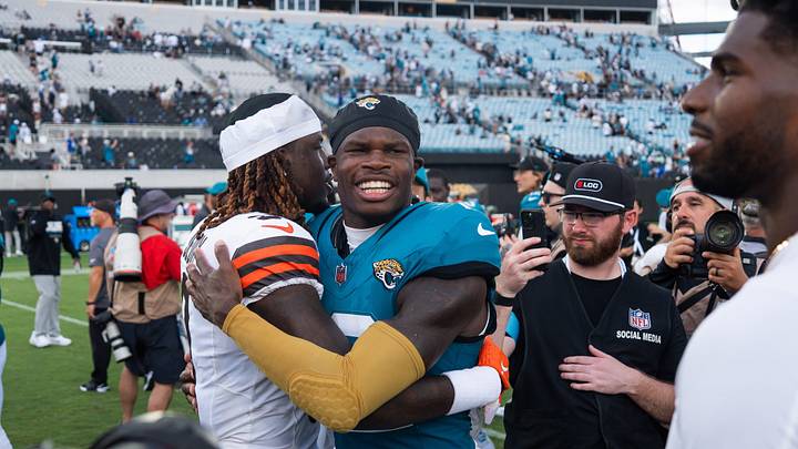 Cleveland Browns wide receiver Jerry Jeudy (3) and Jacksonville Jaguars wide receiver Travis Hunter (12) reunite after the game at mid field during an NFL football game at EverBank Stadium, Sunday, September 13, 2026, in Jacksonville, Fla. Jaguars defeated the Browns 34-10. [Doug Engle/Florida Times-Union]