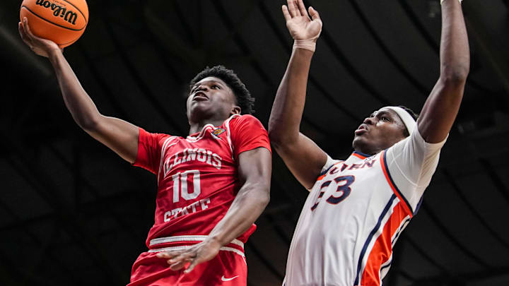 Illinois State Redbirds guard Ty'Reek Coleman (10) goes up for a basket against Auburn Tigers forward Sebastian Williams-Adams (33) on Thursday, April 2, 2026, during an NIT semifinals matchup at Hinkle Fieldhouse in Indianapolis.