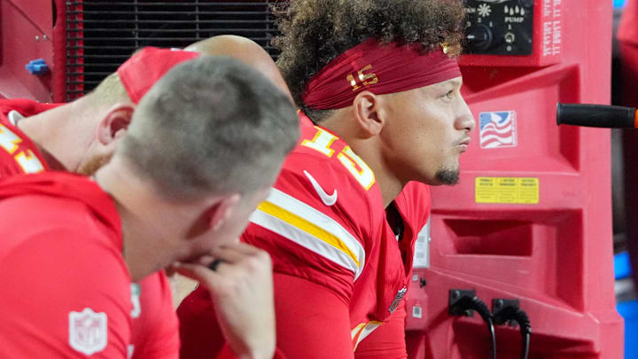 Kansas City Chiefs quarterback Patrick Mahomes (15) watches play against the Baltimore Ravens during the second half at GEHA Field at Arrowhead Stadium.