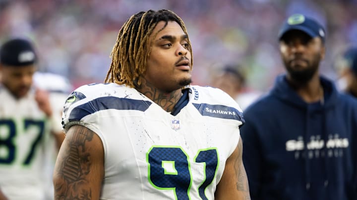 Dec 8, 2024; Glendale, Arizona, USA; Seattle Seahawks defensive tackle Byron Murphy II (91) against the Arizona Cardinals at State Farm Stadium. Mandatory Credit: Mark J. Rebilas-Imagn Images