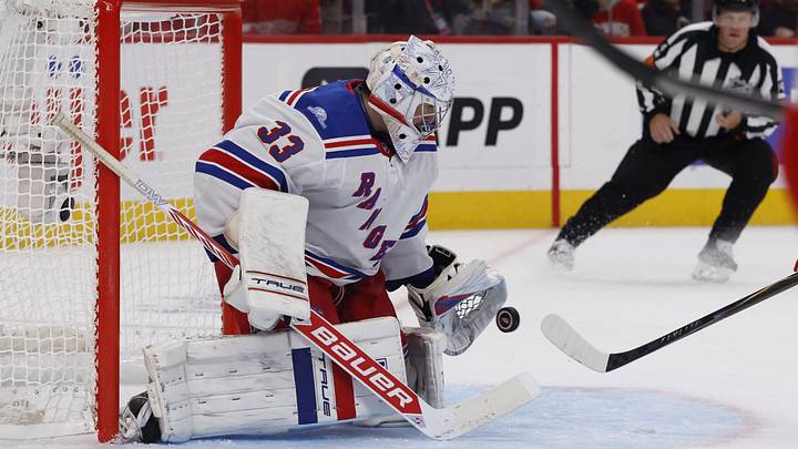 Oct 2, 2026; Detroit, Michigan, USA;  New York Rangers goalie Dylan Garand makes a save in the second period against the Detroit Red Wings at Little Caesars Arena.  Mandatory Credit: Rick Osentoski-Imagn Images