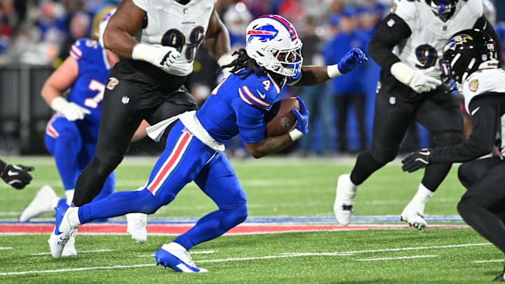 Sep 7, 2025; Orchard Park, New York, USA;  Buffalo Bills running back James Cook (4) runs the ball during the third quarter against the Baltimore Ravens