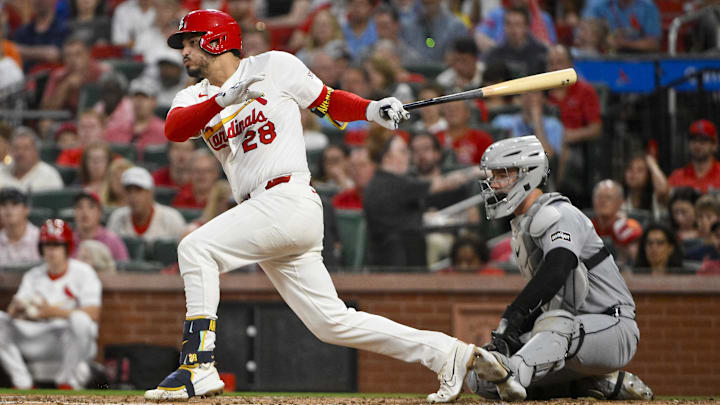May 19, 2025; St. Louis, Missouri, USA; St. Louis Cardinals third baseman Nolan Arenado (28) drives in a run against the Detroit Tigers during the fifth inning at Busch Stadium. May 19, 2025; St. Louis, Missouri, USA; St. Louis Cardinals third baseman Nolan Arenado (28) drives in a run against the Detroit Tigers during the fifth inning at Busch Stadium.