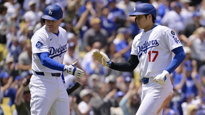 Los Angeles Dodgers first baseman Freddie Freeman (L) and designated hitter Shohei Ohtani