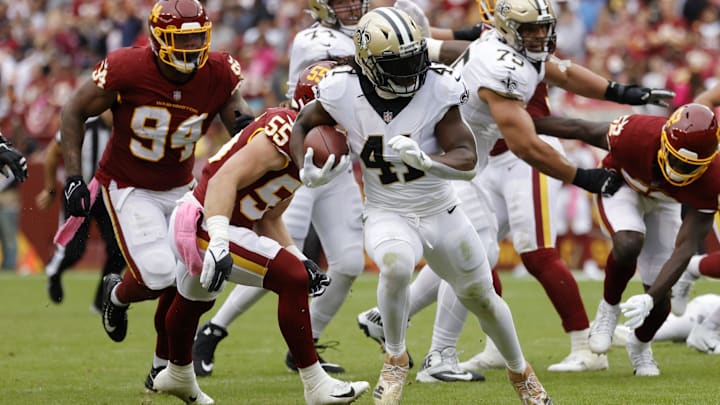 New Orleans Saints running back Alvin Kamara (41) runs the ball for a touchdown against Washington