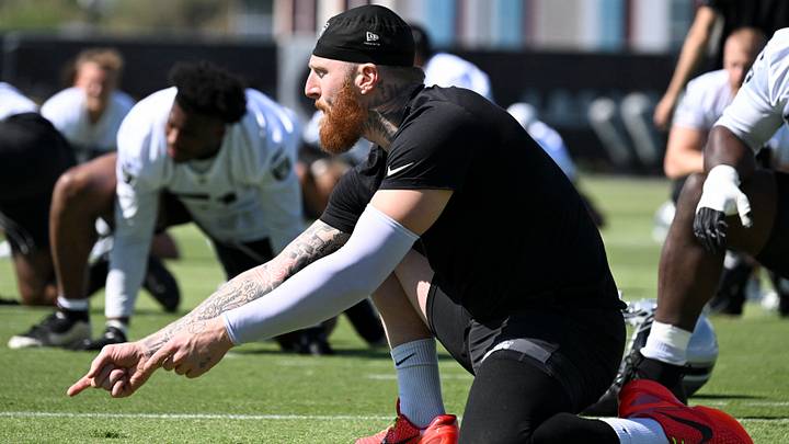 Las Vegas Raiders DE Maxx Crosby warms up during organized team activities at Intermountain Health Performance Center. Las Vegas Raiders DE Maxx Crosby warms up during organized team activities at Intermountain Health Performance Center.