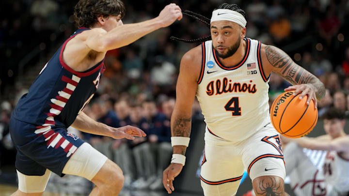 Mar 19, 2026; Greenville, SC, USA; Illinois Fighting Illini guard Kylan Boswell (4) dribbles the ball against the Penn Quakers in the first half of a first round game of the men's 2026 NCAA Tournament at Bon Secours Wellness Arena. Mandatory Credit: Bob Donnan-Imagn Images