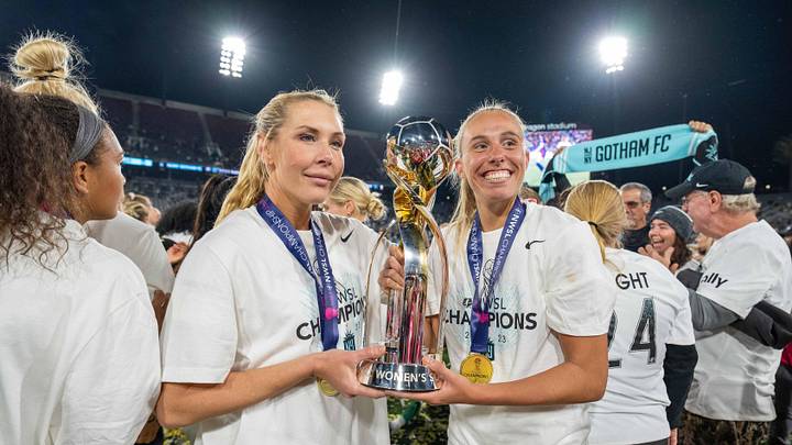 November 11, 2023; San Diego, California, USA; New Jersey/New York Gotham FC midfielder Allie Long (6) and midfielder Maitane Lopez (77) celebrate with the championship trophy after the NWSL Championship match against OL Reign at Snapdragon Stadium. 