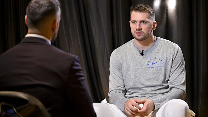 Sep 30, 2024; Dallas, TX, USA; Dallas Mavericks guard Luka Doncic (77) is interviewed during the 2024 Dallas Mavericks media day. Mandatory Credit: Jerome Miron-Imagn Images Sep 30, 2024; Dallas, TX, USA; Dallas Mavericks guard Luka Doncic (77) is interviewed during the 2024 Dallas Mavericks media day. Mandatory Credit: Jerome Miron-Imagn Images