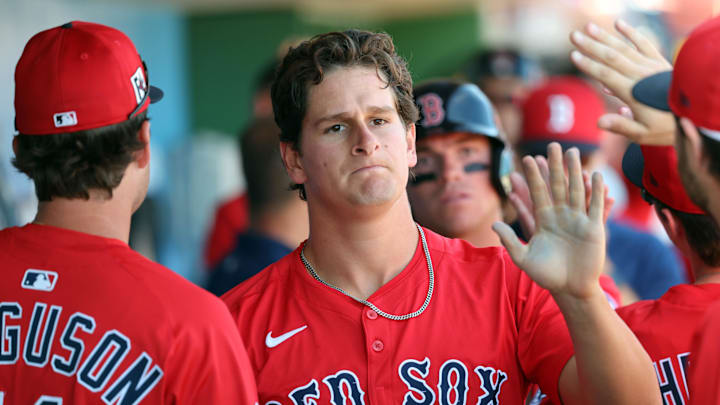 Feb 28, 2025; Clearwater, Florida, USA; Boston Red Sox outfielder Roman Anthony (48) is congratulated after he scored a run against the Philadelphia Phillies during the third inning at BayCare Ballpark. Mandatory Credit: Kim Klement Neitzel-Imagn Images Feb 28, 2025; Clearwater, Florida, USA; Boston Red Sox outfielder Roman Anthony (48) is congratulated after he scored a run against the Philadelphia Phillies during the third inning at BayCare Ballpark. Mandatory Credit: Kim Klement Neitzel-Imagn Images