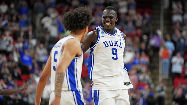 Mar 23, 2025; Raleigh, NC, USA; Duke Blue Devils guard Tyrese Proctor (5) and Duke Blue Devils center Khaman Maluach (9) reacts after a play against the Baylor Bears during the second half in the second round of the NCAA Tournament at Lenovo Center. Mandatory Credit: Bob Donnan-Imagn Images Mar 23, 2025; Raleigh, NC, USA; Duke Blue Devils guard Tyrese Proctor (5) and Duke Blue Devils center Khaman Maluach (9) reacts after a play against the Baylor Bears during the second half in the second round of the NCAA Tournament at Lenovo Center. Mandatory Credit: Bob Donnan-Imagn Images