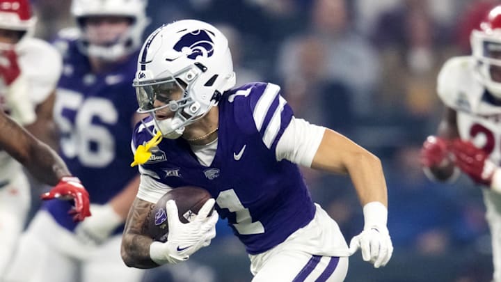 Dec 26, 2024; Phoenix, AZ, USA; Kansas State Wildcats wide receiver Jayce Brown (1) against the Rutgers Scarlet Knights during the Rate Bowl at Chase Field. Mandatory Credit: Mark J. Rebilas-Imagn Images Dec 26, 2024; Phoenix, AZ, USA; Kansas State Wildcats wide receiver Jayce Brown (1) against the Rutgers Scarlet Knights during the Rate Bowl at Chase Field. Mandatory Credit: Mark J. Rebilas-Imagn Images