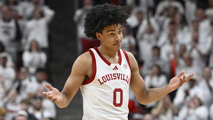 Feb 9, 2026; Louisville, Kentucky, USA;  Louisville Cardinals guard Mikel Brown Jr. (0) reacts during the second half against the NC State Wolfpack at KFC Yum! Center. Louisville defeated N.C. State 118-77. Mandatory Credit: Jamie Rhodes-Imagn Images