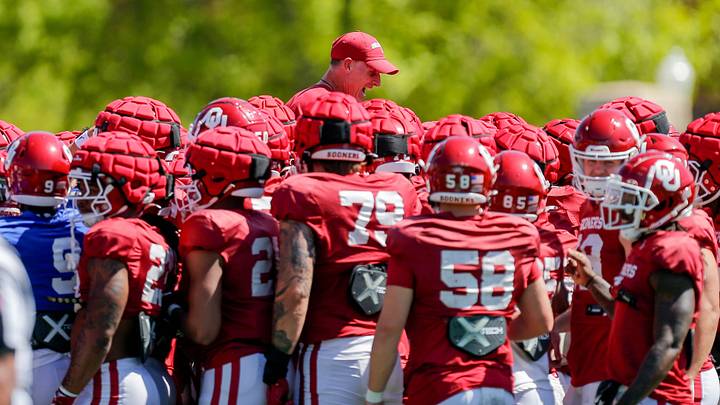 Players lift up head coach Brent Venables during an Oklahoma football practice in Norman, Oklahoma Players lift up head coach Brent Venables during an Oklahoma football practice in Norman, Oklahoma