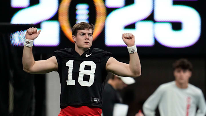 Ohio State Buckeyes quarterback Will Howard (18) practices for the College Football Playoff against the Notre Dame Fighting Irish at the Mercedes-Benz Stadium in Atlanta on Jan. 18, 2025.