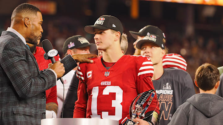 Jan 28, 2024; Santa Clara, California, USA; Fox Sports broadcaster and former NFL player Michael Strahan interviews San Francisco 49ers quarterback Brock Purdy (13) after winning the NFC Championship football game against the Detroit Lions at Levi's Stadium. Mandatory Credit: Kelley L Cox-Imagn Images