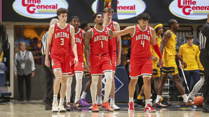 The Arizona Wildcats beat West Virginia 75-56 on Tuesday night.