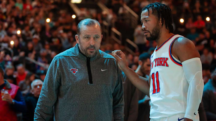 Nov 20, 2022; Phoenix, Arizona, USA; New York Knicks head coach Tom Thibodeau with guard Jalen Brunson (11) against the Phoenix Suns at Footprint Center. Mandatory Credit: Mark J. Rebilas-Imagn Images