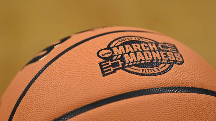 Mar 26, 2026; San Jose, CA, USA; The NCAA March Madness logo is seen on a basketball in the first half between the Texas Longhorns and the Purdue Boilermakers during a Sweet Sixteen game of the West Regional of the men's 2026 NCAA Tournament at SAP Center. Mandatory Credit: Eakin Howard-Imagn Images