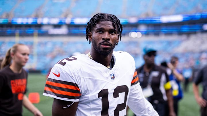 Aug 8, 2025; Charlotte, North Carolina, USA; August 8, 2025: Cleveland Browns quarterback Shedeur Sanders (12) walks off before the game against the Carolina Panthers at Bank of America Stadium.