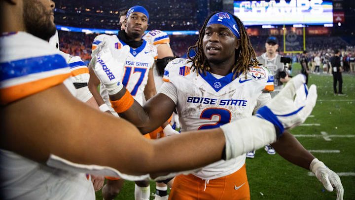 Boise State Broncos running back Ashton Jeanty greets teammates following the game against the Penn State Nittany Lions.