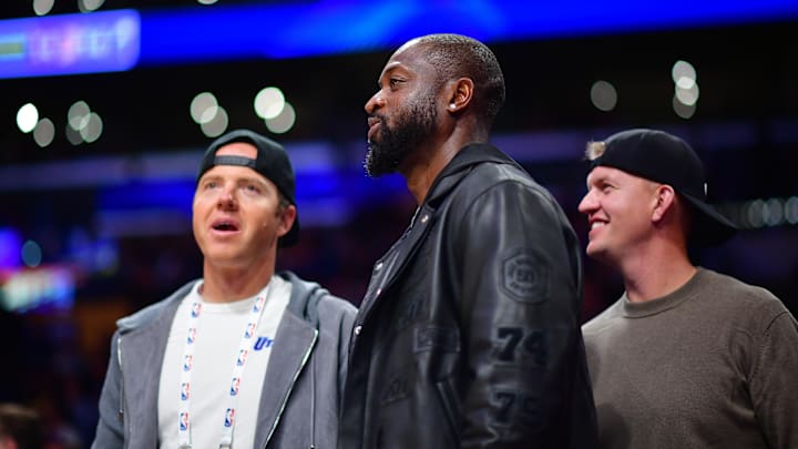 Nov 19, 2024; Los Angeles, California, USA; Utah Jazz minority owner Dwyane Wade with majority owner Ryan Smith (left) watch game action against the Los Angeles Lakers during the second half at Crypto.com Arena. Mandatory Credit: Gary A. Vasquez-Imagn Images Nov 19, 2024; Los Angeles, California, USA; Utah Jazz minority owner Dwyane Wade with majority owner Ryan Smith (left) watch game action against the Los Angeles Lakers during the second half at Crypto.com Arena. Mandatory Credit: Gary A. Vasquez-Imagn Images