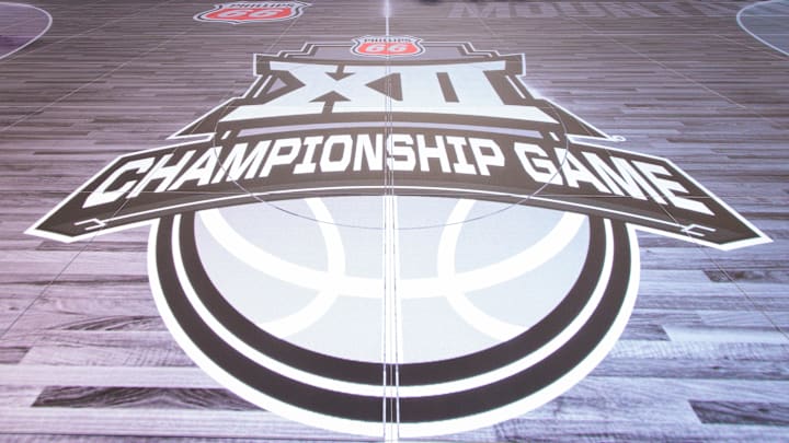 Mar 8, 2026; Kansas City, MO, USA; Championship game logo at center court in the new digital floor prior to the game between the West Virginia Mountaineers and the TCU Horned Frogs at T-Mobile Center. Mandatory Credit: William Purnell-Imagn Images