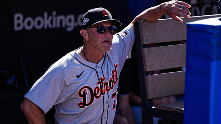 Detroit Tigers first base coach Anthony Iapoce (76) watches warm up from the dugout before Game 2 of AL wild-card series against Cleveland Guardians at Progressive Field in Cleveland, Ohio on Wednesday, Oct. 1, 2025.