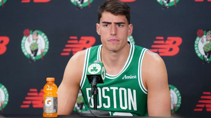 Sep 29, 2025; Boston, MA, USA; Boston Celtics center Luka Garza (52) talks with reporters during media day at the Auerbach Center. Mandatory Credit: David Butler II-Imagn Images