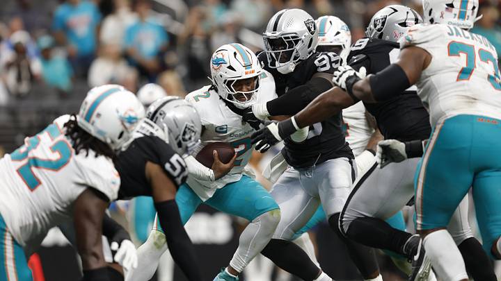 Las Vegas Raiders defensive tackle Thomas Booker IV (99) sacks Miami Dolphins quarterback Malik Willis (2) in the fourth quarter at Allegiant Stadium. Las Vegas Raiders defensive tackle Thomas Booker IV (99) sacks Miami Dolphins quarterback Malik Willis (2) in the fourth quarter at Allegiant Stadium.