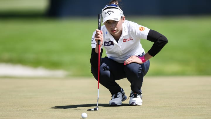 Atthaya Thitikul lines up a putt on the 18th green during the second round of the 2024 U.S. Women's Open.
