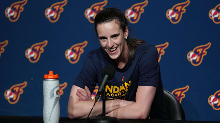 Indiana Fever guard Clark talks to media members pregame