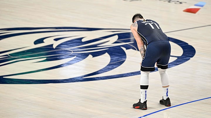 Jun 14, 2024; Dallas, Texas, USA; Dallas Mavericks guard Luka Doncic (77) looks down at center court during game four between the Dallas Mavericks and the Boston Celtics in the 2024 NBA Finals at American Airlines Center. 