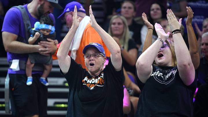 Mercury fans cheer on Fever guard Sophie Cunningham after a welcome back at PHX Arena in Phoenix on Aug. 7, 2025. Mercury fans cheer on Fever guard Sophie Cunningham after a welcome back at PHX Arena in Phoenix on Aug. 7, 2025.