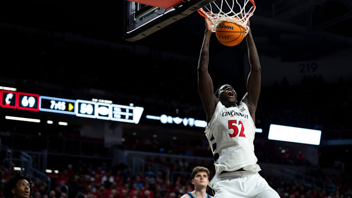 Cincinnati Bearcats center Moustapha Thiam (52) dunks in the second half of the NCAA Basketball game at Fifth Third Arena in Cincinnati on Tuesday, March 3, 2026.